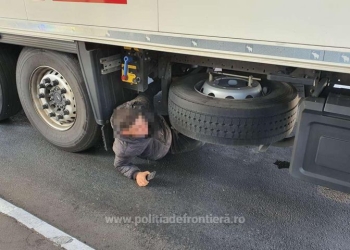 Migranți ascunși în TIR