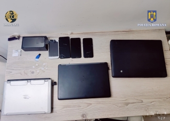 VIDEO Mascații au descins la persoane din Timiș, suspectate de infracțiuni informatice