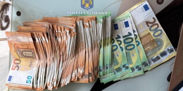 Mii de euro și de țigări confiscate, în Timișoara! Au fost percheziții la persoane suspectate de contrabandă